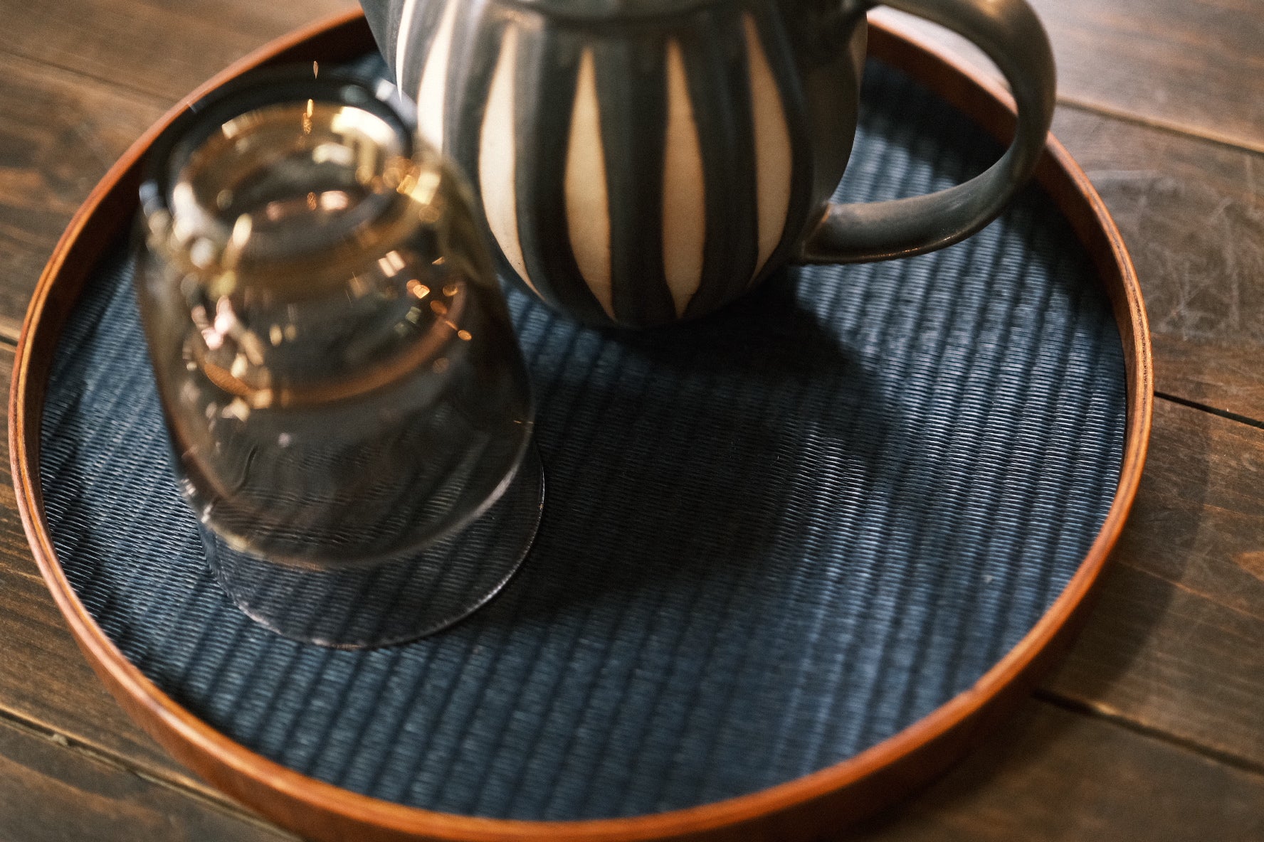 Tatami round serving tray — handwoven modern obon from Kumamoto